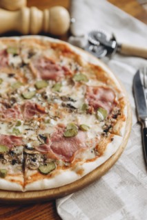Pizza pie on table