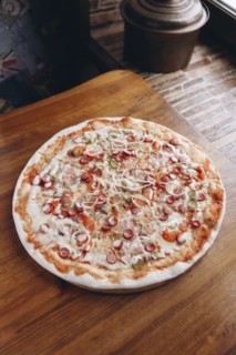 Pizza pie on table