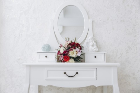 Bouquet of flowers on white vanity