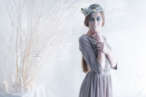 Ethereal woman wearing dress and makeup