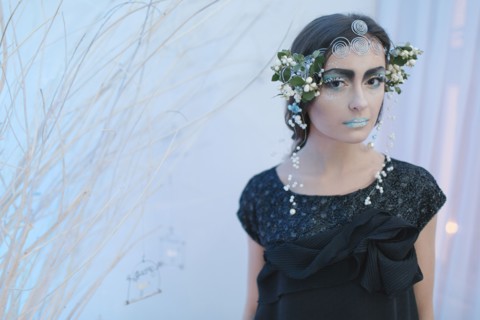 Ethereal woman wearing dress and makeup