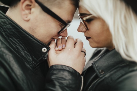 Affectionate Middle Eastern couple holding hands