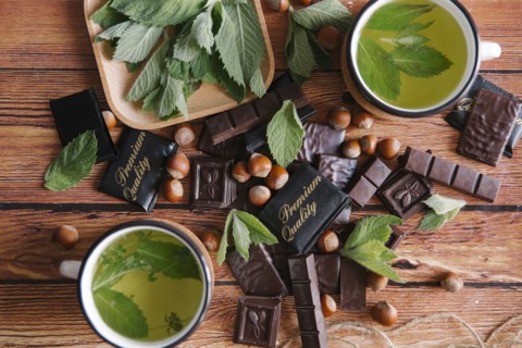 Premium quality chocolate near green tea