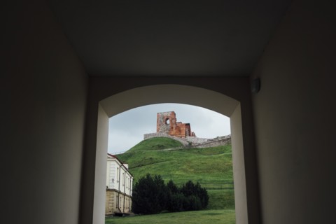 Scenic view of hill from arch