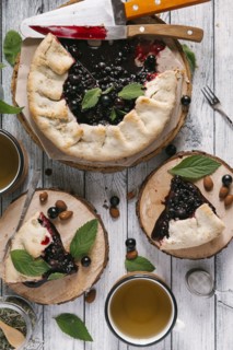 Blueberry pie on wooden table