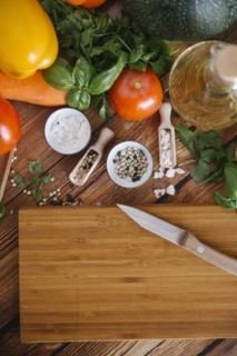 Ingredients for salad near cutting board