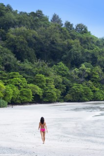 Woman walking on beach