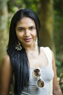 Smiling Mixed Race woman posing