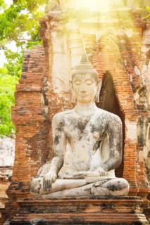 Sunbeams on Buddha statue