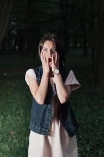 Caucasian woman surprised at night
