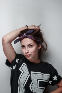 Confident Caucasian woman wearing football jersey