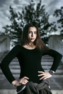 Portrait of Caucasian woman with hands on hips