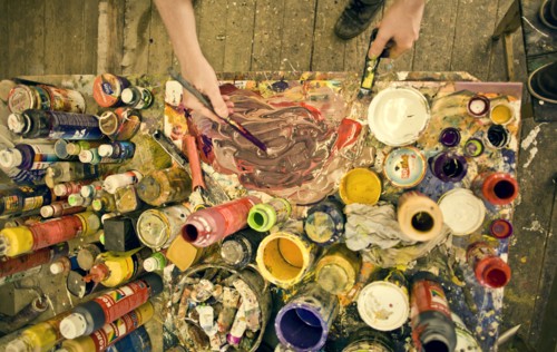 Caucasian artist working in studio