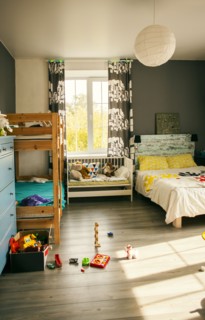 Bunk beds and crib in bedroom of child
