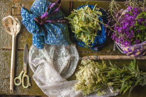 Fresh flowers and muslin arranged on table