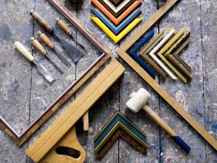 Picture frame tools on splattered table