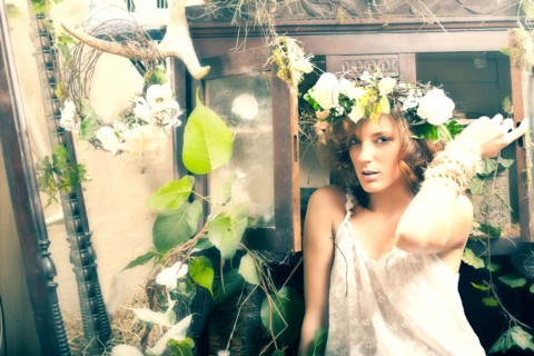 Portrait of serious Caucasian woman sitting in garden