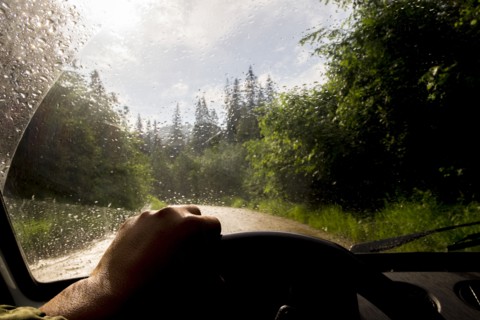 Windshield of car driving in rain