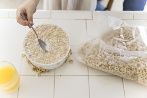 Girl eating bowl of cereal