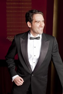Elegant Hispanic man in tuxedo