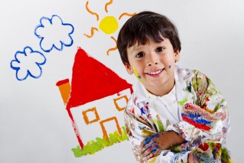 Hispanic boy painting