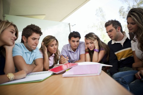 Hispanic college students doing homework