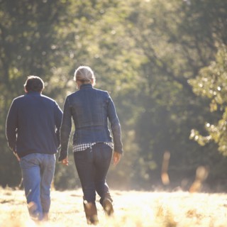 Caucasian couple walking together outdoors