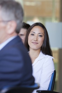 Business people sitting together in conference room