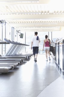 Couple walking together in health club
