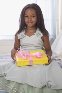 African American girl holding gift