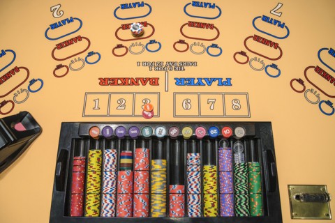 Gambling chips at baccarat table
