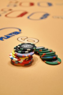 Gambling chips at baccarat table