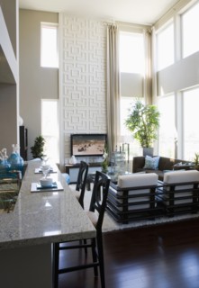 Contemporary loft interior with breakfast bar and living room
