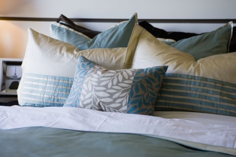 Collection of pillows on bed
