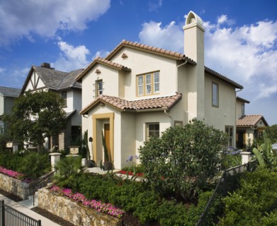 Front exterior contemporary Spanish style home