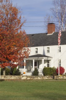 Exterior of single family home with lawn