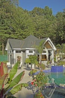 Swimming pool in front of pool house