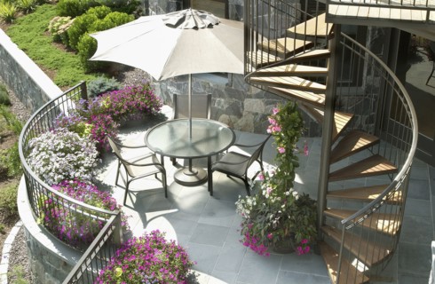 Contemporary patio with spiral staircase