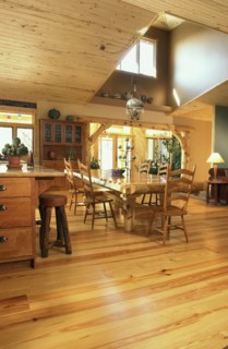 Interior of contemporary great room with pine hardwood floors