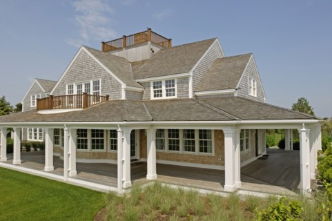 Exterior contemporary shingle style home with rooftop balcony