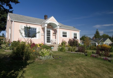 Exterior view of a one story peach colored house at Bellingham