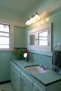 Interior shot of aquamarine bathroom
