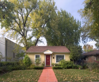 Front exterior yellow cottage