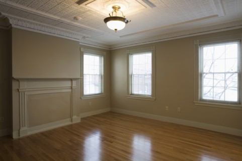 Empty room in apartment with hardwood floor