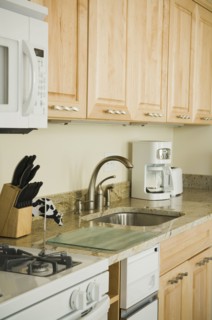 Traditional kitchen with light colored cabinets