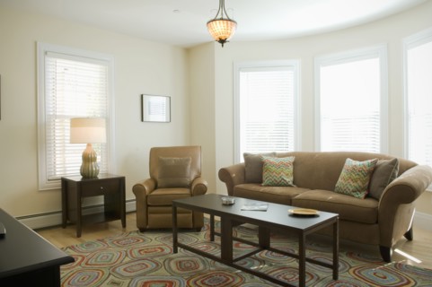 Living room with colorful area rug