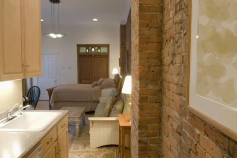 Brick wall in small studio apartment