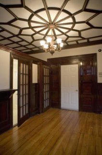Empty room in apartment with hardwood floor