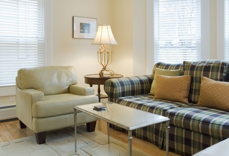 Living room with plaid sofa