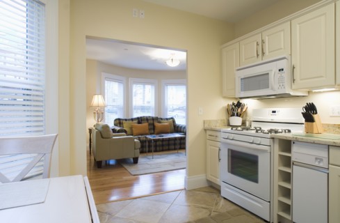 Traditional kitchen with doorway to living room
